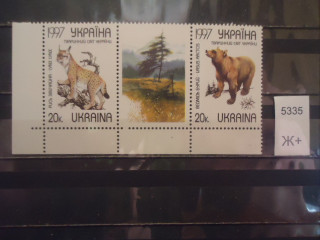 Фото марки Украина 1997г сцепка с купоном **