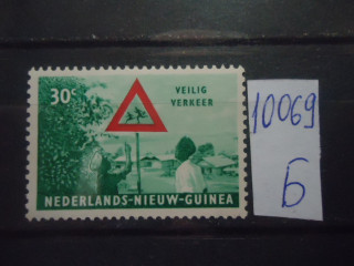Фото марки Новая Гвинея **