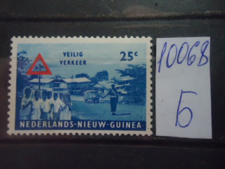Фото марки Новая Гвинея **