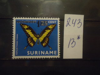 Фото марки Суринам 1977г надпечатка **